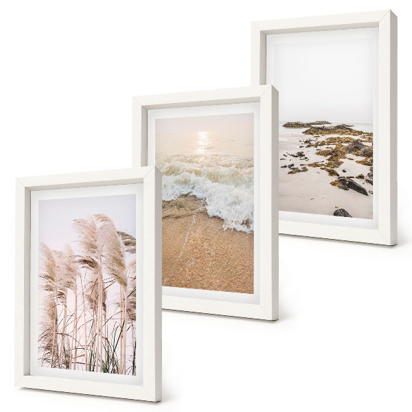 Triptyk tavla med ram Strandgräsvågor och stenar vid havet i boho-stil