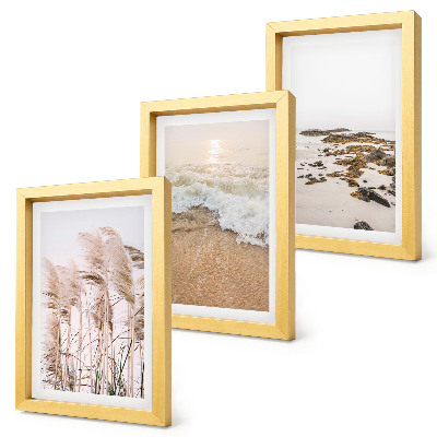 Triptyk tavla med ram Strandgräsvågor och stenar vid havet i boho-stil