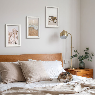 Triptyk tavla med ram Strandgräsvågor och stenar vid havet i boho-stil