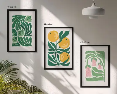 Tavelset ovanför soffan med minimalistiska växtmönster