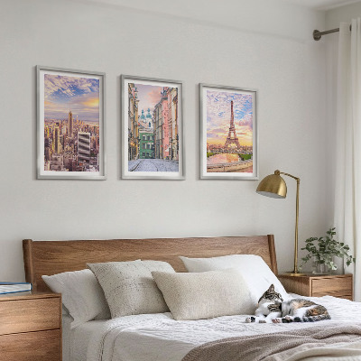 Tavelset ovanför soffa Städer New York Paris skymning