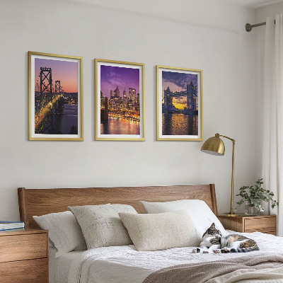 Tavelset ovanför soffa Broar, sol, stadsutsikt