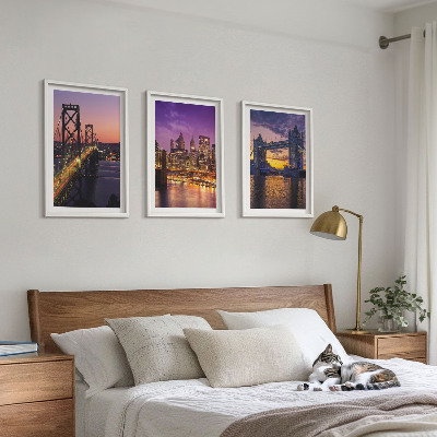 Tavelset ovanför soffa Broar, sol, stadsutsikt