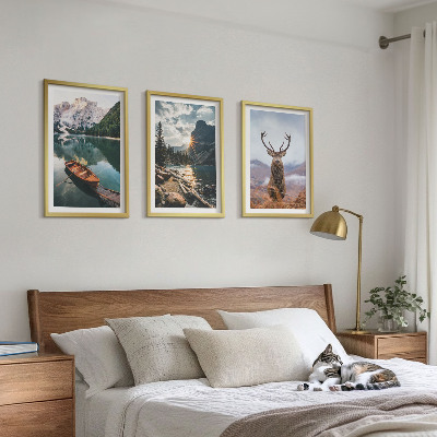 Tavelpaket med ramar Bergsjö båt solnedgång hjort