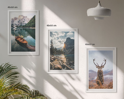 Tavelpaket med ramar Bergsjö båt solnedgång hjort