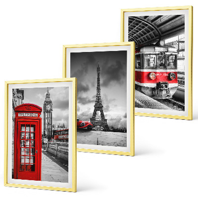 Tavelset ovanför soffa Ikoner London Paris transport