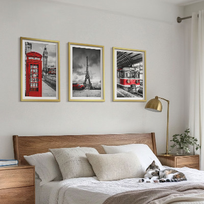 Tavelset ovanför soffa Ikoner London Paris transport