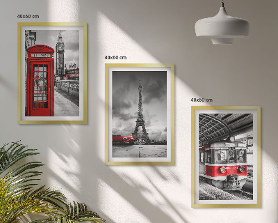 Tavelset ovanför soffa Ikoner London Paris transport