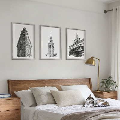 Tavelset ovanför soffa Arkitektoniska svartvita byggnader