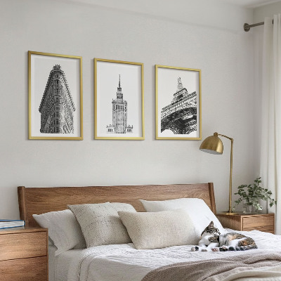 Tavelset ovanför soffa Arkitektoniska svartvita byggnader