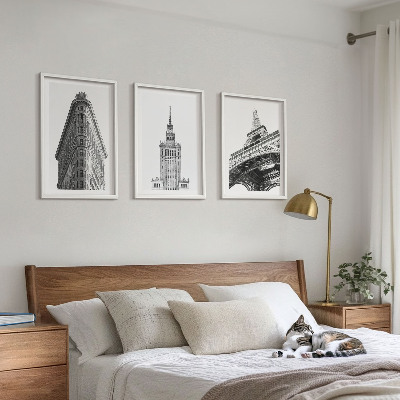 Tavelset ovanför soffa Arkitektoniska svartvita byggnader