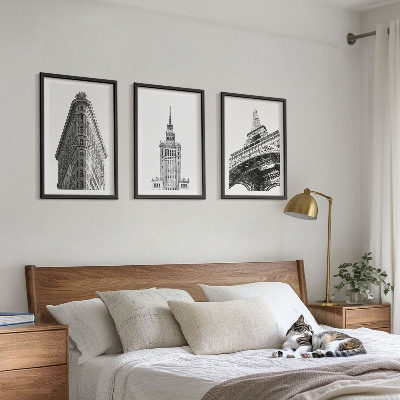 Tavelset ovanför soffa Arkitektoniska svartvita byggnader
