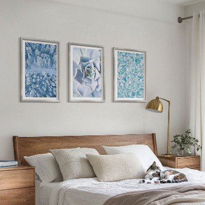 Tavelset ovanför soffa Vinterskog blå blomma vatten