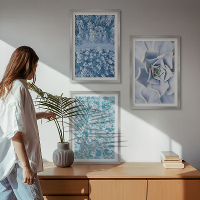 Tavelset ovanför soffa Vinterskog blå blomma vatten