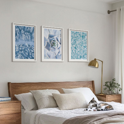 Tavelset ovanför soffa Vinterskog blå blomma vatten