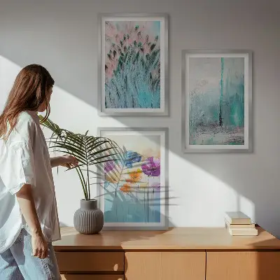 Set med 3 tavlor med mönster av pastellfärgade blommor