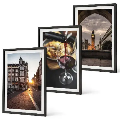 Tavelset med stadsmotiv bilder från London ovanför soffa