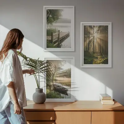 Set med 3 tavlor med motiv av sjö, skog, båt och morgondimma