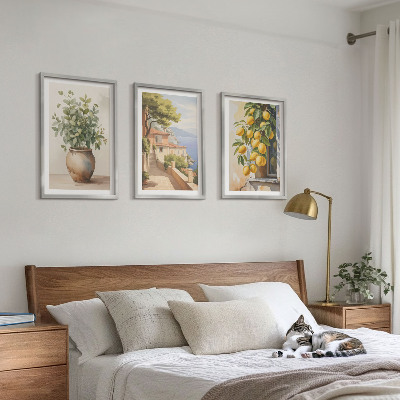 Tavelset ovanför soffa Blommor i en vas, ett hav av citroner