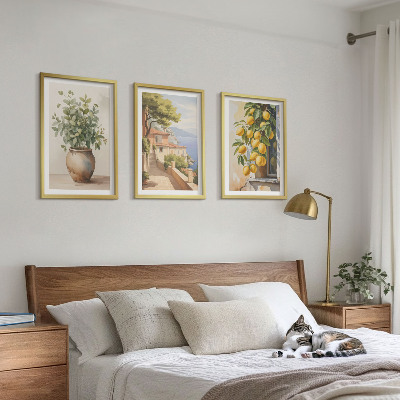 Tavelset ovanför soffa Blommor i en vas, ett hav av citroner