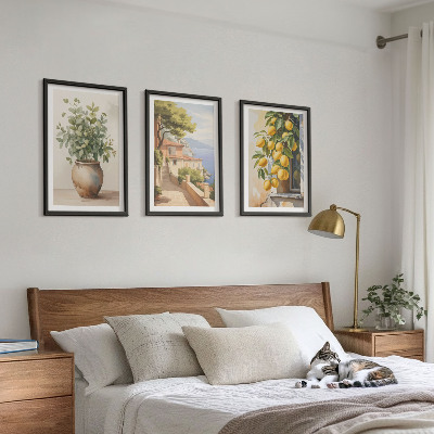 Tavelset ovanför soffa Blommor i en vas, ett hav av citroner