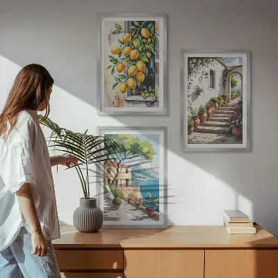 Tavelset med ramar citroner, blommor och havsutsikt