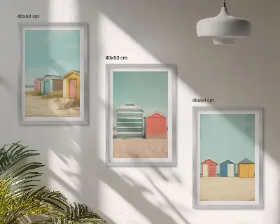 Tavelset med ramar färgglada hus vid stranden i solsken