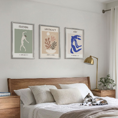 Tavelset ovanför soffa Matisses eleganta växtfigurer