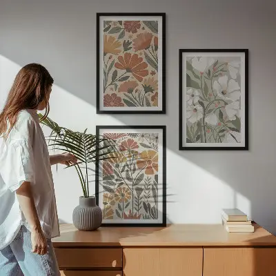 Tavelset med ramar blommönster i orange och grönt