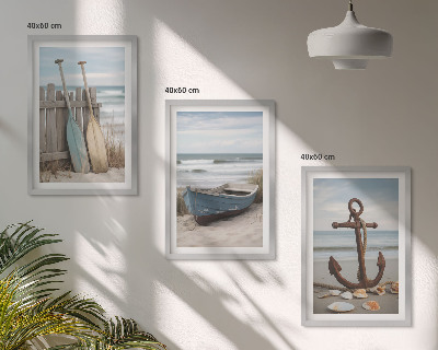 Tavelset ovanför soffa strand båt ankare sand