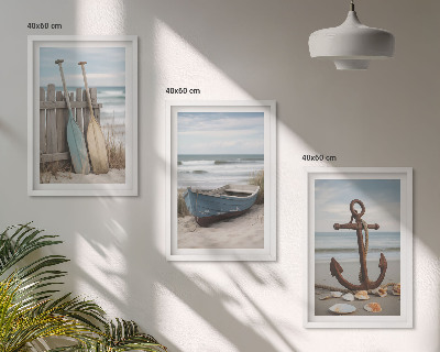 Tavelset ovanför soffa strand båt ankare sand