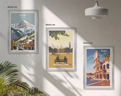 Tavelset ovanför soffa med motiv av Ouraybergen och London Coliseum