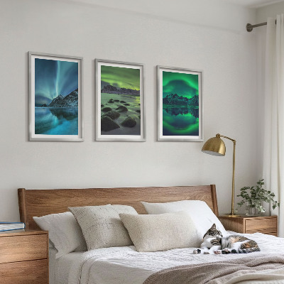 Tavelset ovanför soffa Vinterlandskap med norrsken