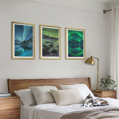 Tavelset ovanför soffa Vinterlandskap med norrsken