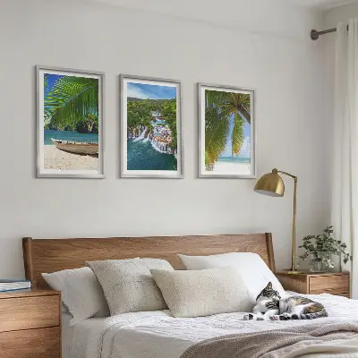 Tavelset med ramar strand, båt, vattenfall och palmer