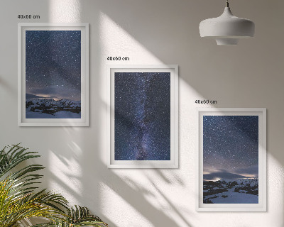 Tavelset ovanför soffa Natthimlen berg stjärnor