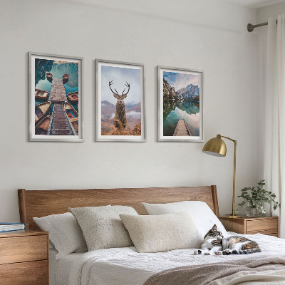 Tavelset ovanför soffa Sjöbåtar hjortberg