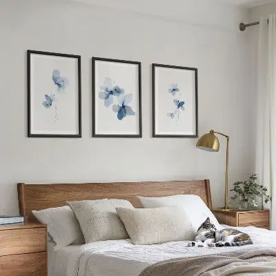 Blå blommor set om 3 tavlor