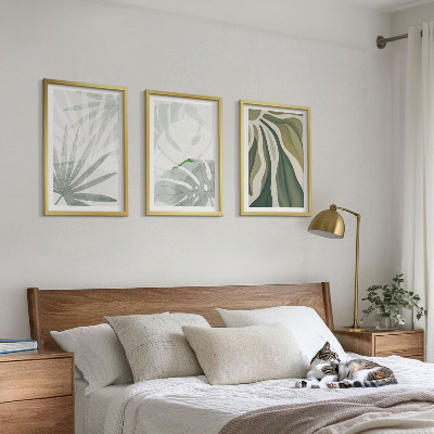 Tavelset ovanför soffa Växters blad i grönt och grått
