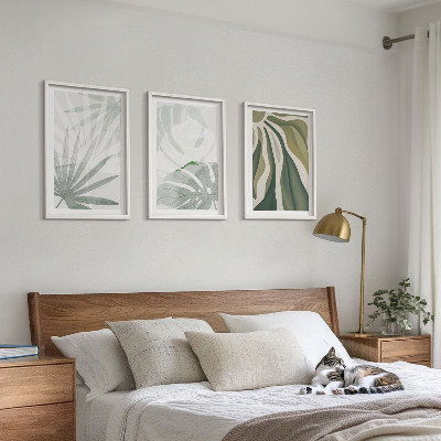 Tavelset ovanför soffa Växters blad i grönt och grått