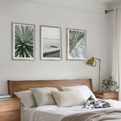 Tavelset ovanför soffa Palmblad träbro
