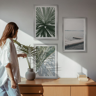 Tavelset ovanför soffa Palmblad träbro