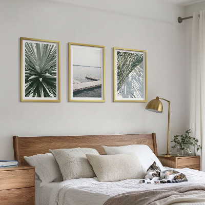 Tavelset ovanför soffa Palmblad träbro