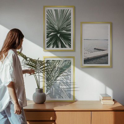 Tavelset ovanför soffa Palmblad träbro