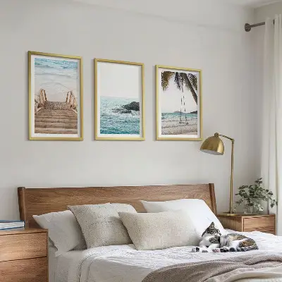 Tavelset med motiv av trappor vid havsstrand och gunga set om 3 tavlor