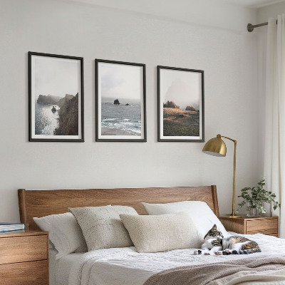 Tavelset ovanför soffa Landskap av berg och hav