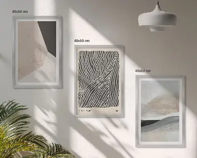 Tavelset ovanför soffan abstrakta mönster i beige och grått