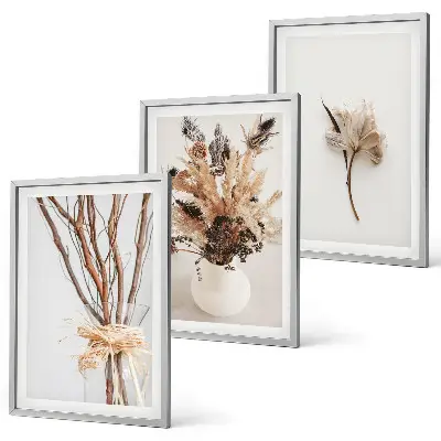 Tavelvägg med blommor och grenar minimalistiska motiv med ramar
