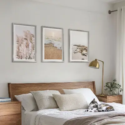 Tavelset med ramar med motiv av strandgräs, vågor och stenar i boho-stil