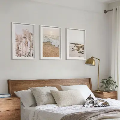 Tavelset med ramar med motiv av strandgräs, vågor och stenar i boho-stil